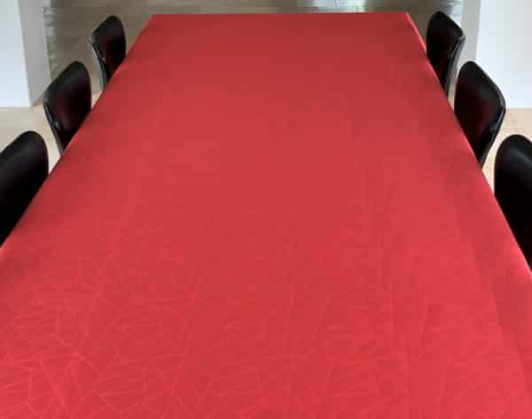 Jacquardvævet textildug, Rød med indfarvet mønster og antiskrid, 140 cm fra textilogvoksdug.dk